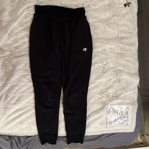 Black Champion Reverse Weave Sweatpants in men’s size medium.